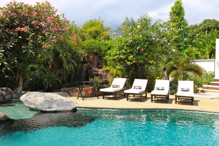 Sun beds at the swimming pool